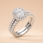 2 CT oval-cut halo moissanite bridal ring set in 925 sterling silver on a peach background