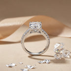 Side view of a 3 CT Asscher-cut moissanite ring displayed with crystal accents