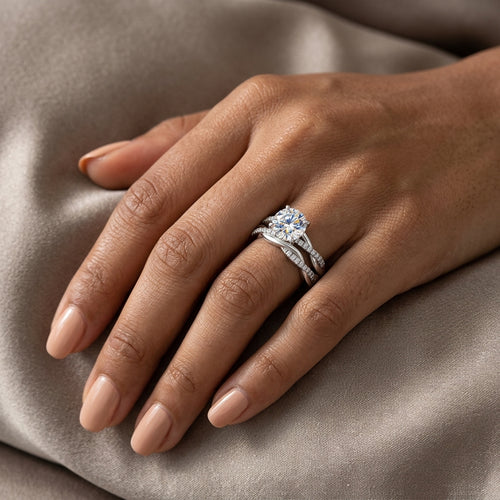 Woman wearing a 3 CT round-cut moissanite engagement ring