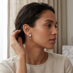 Woman styling a 4MM moissanite hoop earring for everyday wear