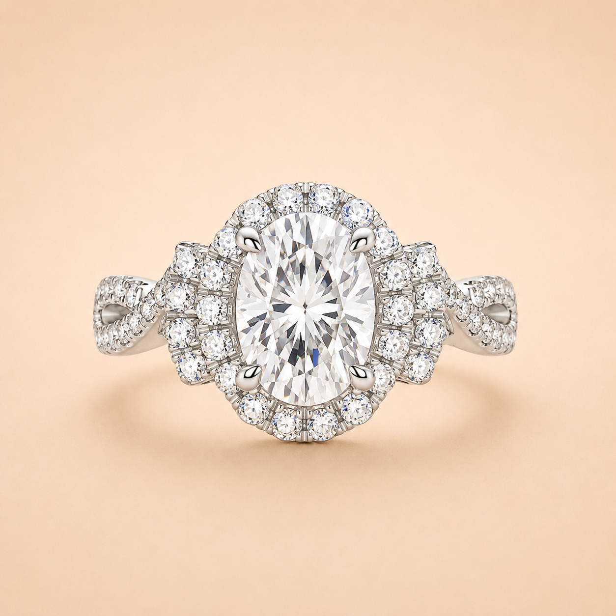 Front view of a 2 CT oval-cut moissanite halo engagement ring with an infinity-style band