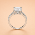 Front view of a 3 CT Asscher-cut moissanite engagement ring with a pavé sterling silver band
