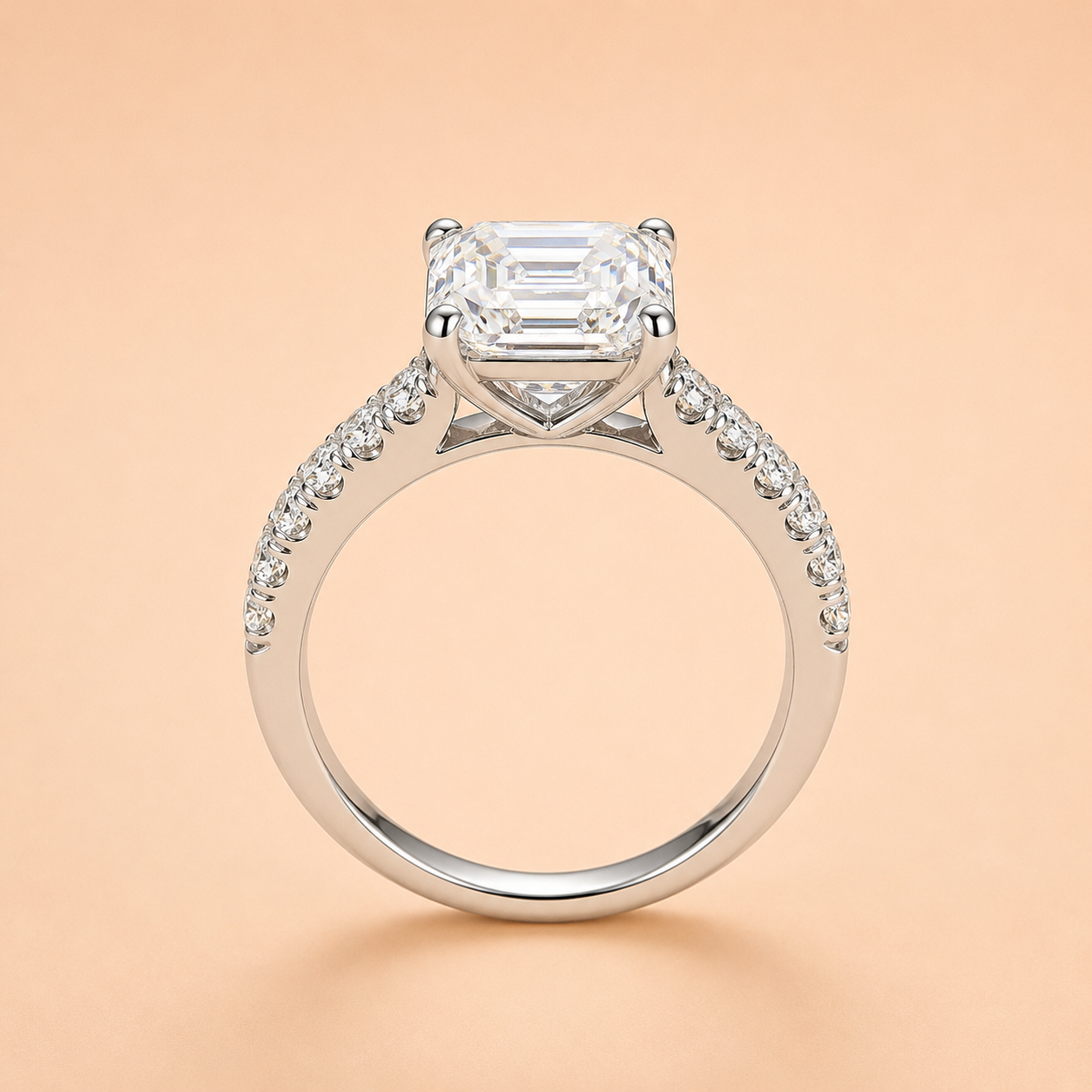 Front view of a 3 CT Asscher-cut moissanite engagement ring with a pavé sterling silver band