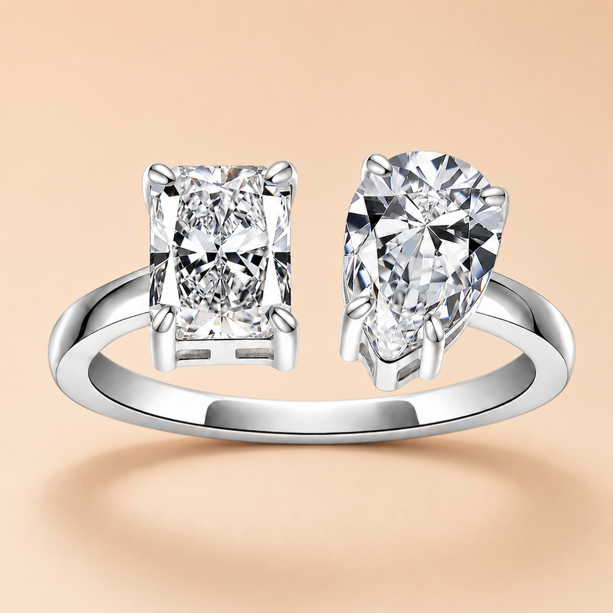 4.5 CTTW radiant and pear-cut moissanite Toi et Moi engagement ring in sterling silver