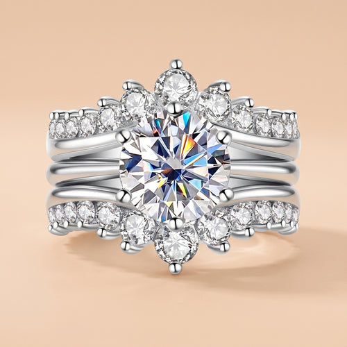 3 CT round-cut moissanite bridal ring set in 925 sterling silver on a peach background