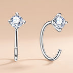 Pair of 4MM round moissanite hoop earrings in white gold-plated sterling silver