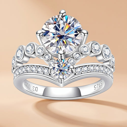3 CT round-cut crown moissanite engagement ring in 925 sterling silver on a beige background