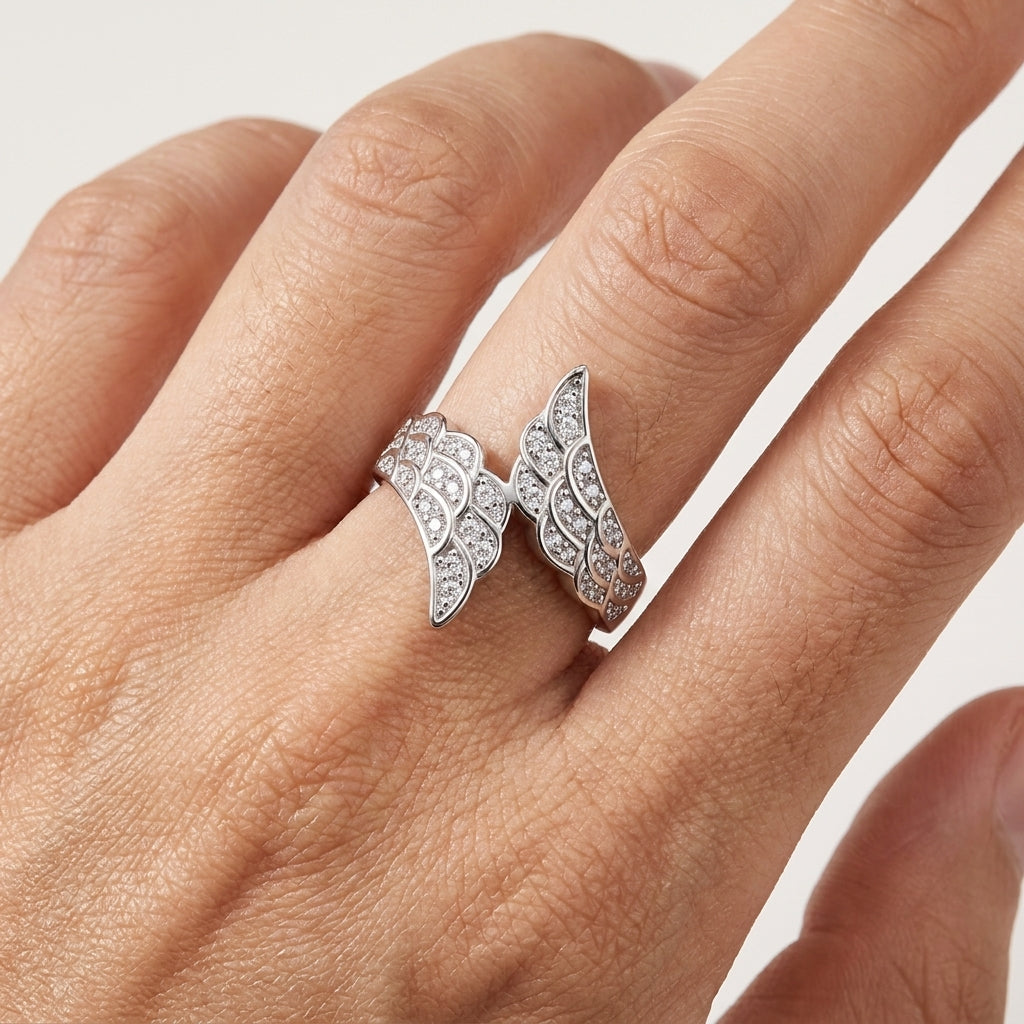 VVS1 D Color Moissanite Angel Wings Wedding Band in sterling silver featuring brilliant round-cut moissanite stones for women.