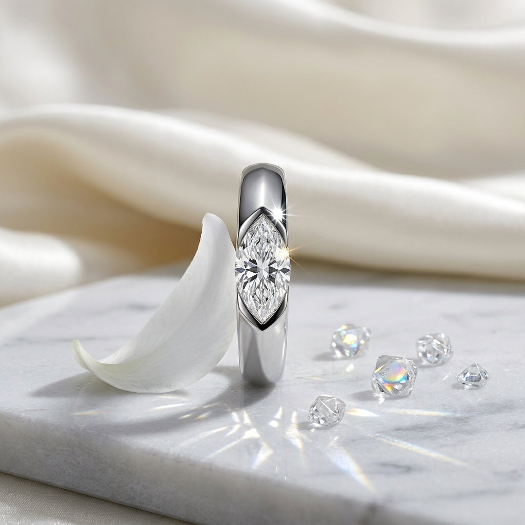 Woman wearing a marquise-cut moissanite solitaire ring with a cream blazer
