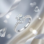 Oval-cut moissanite pavé engagement ring displayed with silver ribbon and crystal accents.